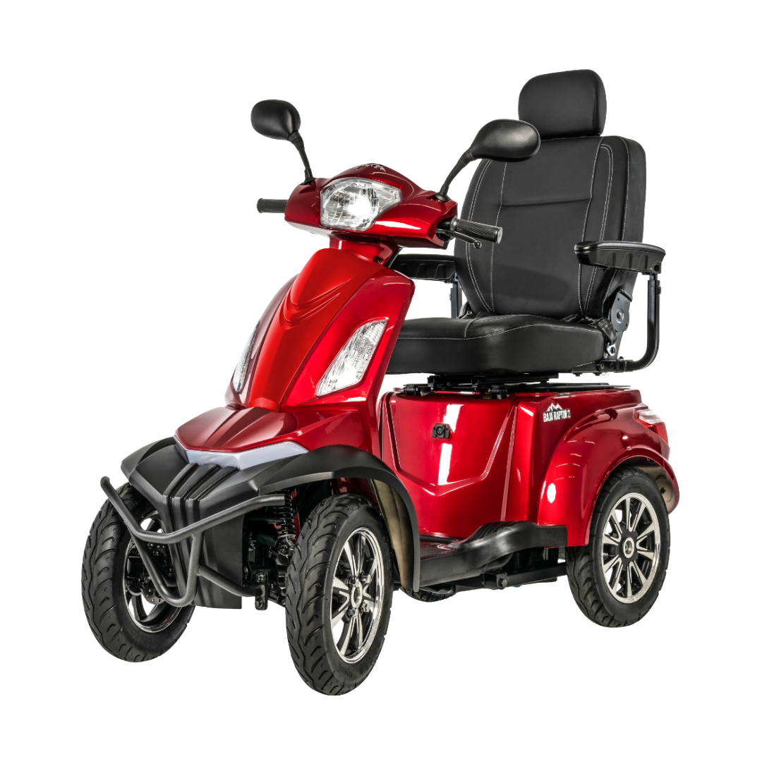The Pride Baja® Raptor® 2 Bariatric 4-Wheel Scooter is a red mobility scooter with cushioned seat, armrests, handlebar controls, rearview mirrors, and four wheels, ideal for personal outdoor transportation.